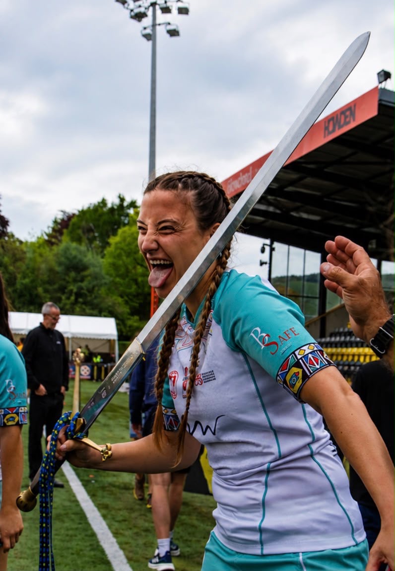 Sevens player pulling a face during the trophy celebration