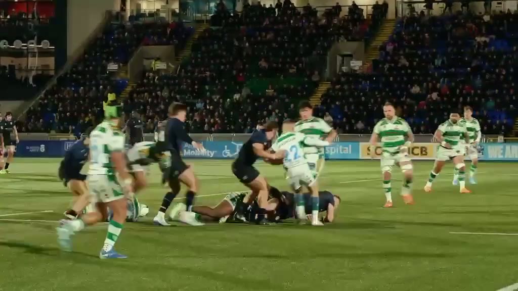 Still from the Brownlow Media rugby showreel: match action under floodlights